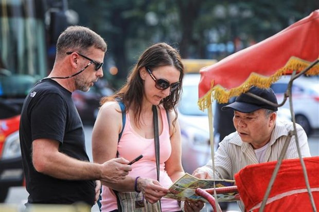 Turistas extranjeros en Vietnam (Fuente:VNA)