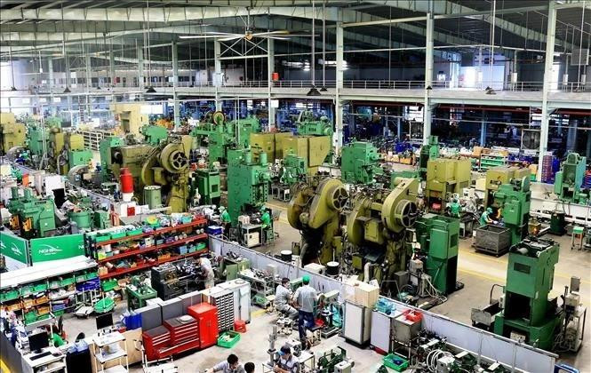 En una fábrica en el parque industrial de Tan Phu Trung de Ciudad Ho Chi Minh. (Foto: VNA)