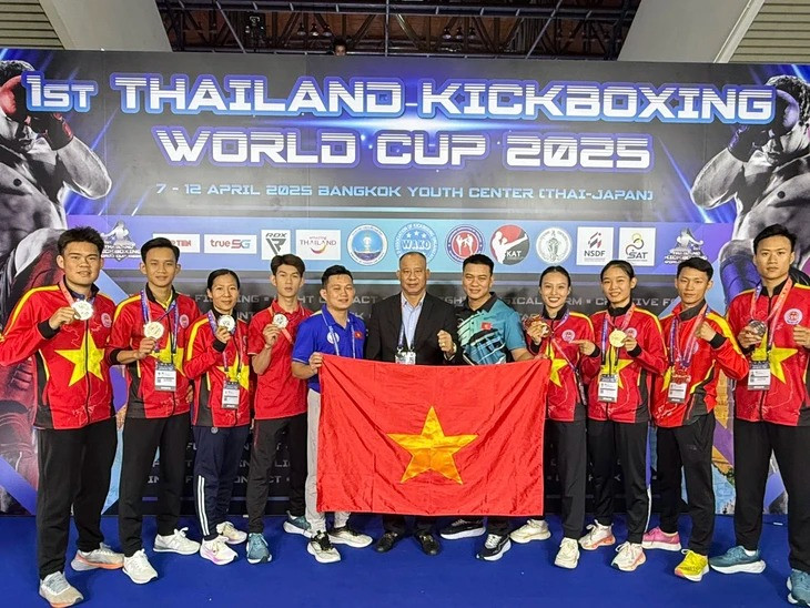 Atletas y entrenadores vietnamitas en el torneo (Foto: VNA)
