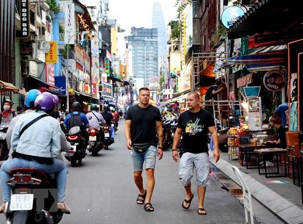 Turistas extranjeros en Ciudad Ho Chi Minh. (Fotografía: VNA)