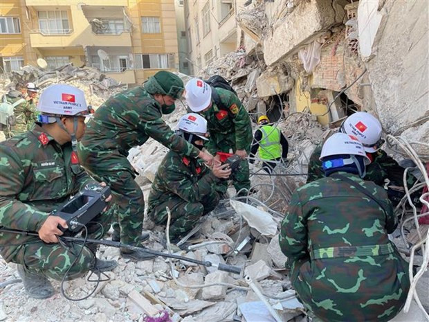 Oficiales vietnamitas en la operación. (Fotografía: VNA)