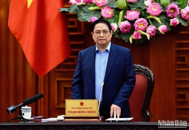 El primer ministro Pham Minh Chinh interviene en la reunión. (Fotografía: Nhan Dan)