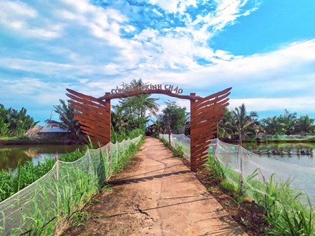 Una puerta a Con Chim, un islote ubicado en el distrito de Chau Thanh, provincia sureña de Tra Vinh. (Fotografía: thamhiemmekong.com)