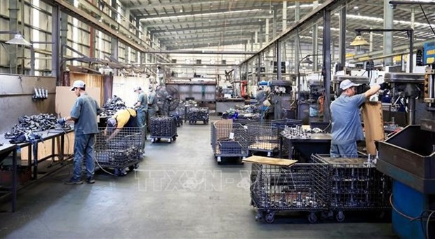 En una empresa de IED en el parque industrial de Giang Dien, en la provincia sureña Dong Nai. (Fotografía: VNA)