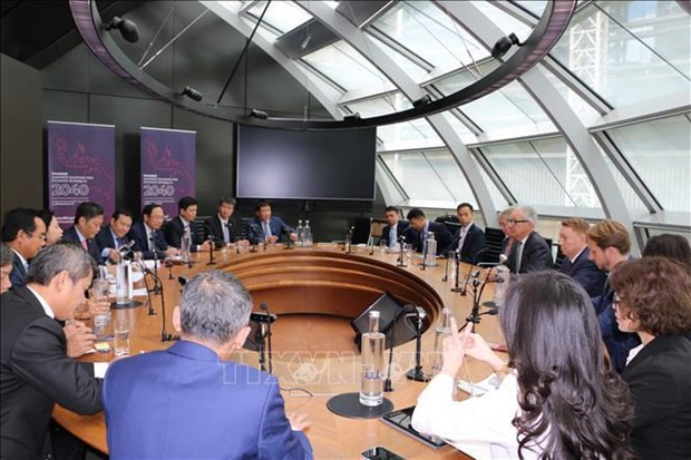 En una sesión de trabajo entre la delegación vietnamita y Australia. (Fotografía: VNA)