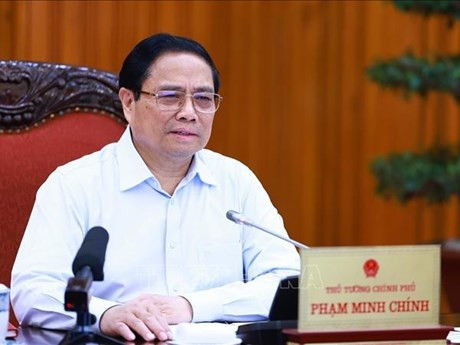 El primer ministro de Vietnam, Pham Minh Chinh, preside la reunión (Foto: VNA)