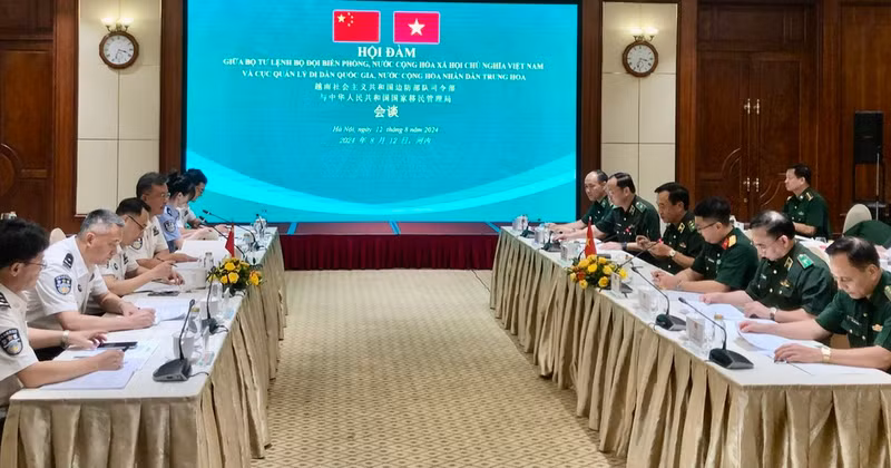 En la reunión. (Foto: baotintuc.vn)