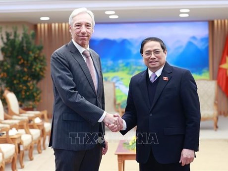 El primer ministro vietnamita, Pham Minh Chinh, y el canciller portugués, Joao Gomes Cravinho (Fotografía: VNA)