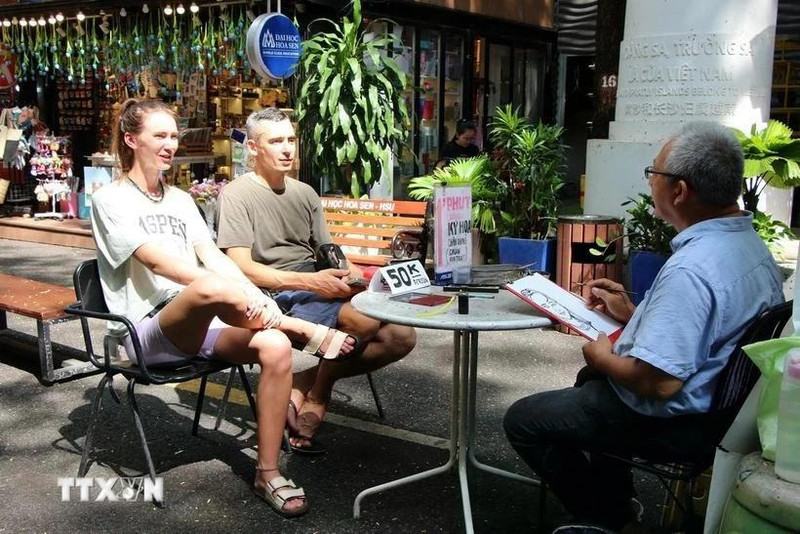 Turistas extranjeros en Ciudad Ho Chi Minh. (Fuente: VNA)