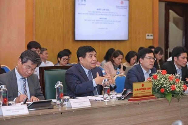 El ministro de Planificación e Inversión, Nguyen Chi Dung, interviene en la cita. (Fotografía: VNA)