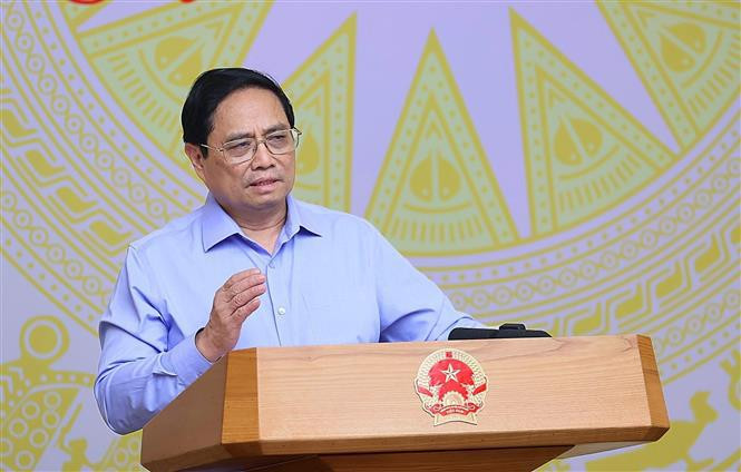 El primer ministro de Vietnam, Pham Minh Chinh, en la sesión de trabajo. (Fotografía: VNA)