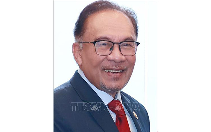 El primer ministro Pham Minh Chinh y el primer ministro de Malasia, Anwar Ibrahim, en su reunión en Indonesia en mayo de 2023 . (Foto: Chinhphu.vn)