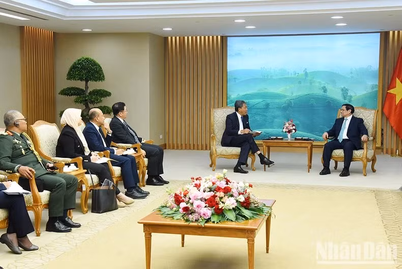 Los miembros de la delegación malasia en la reunión.