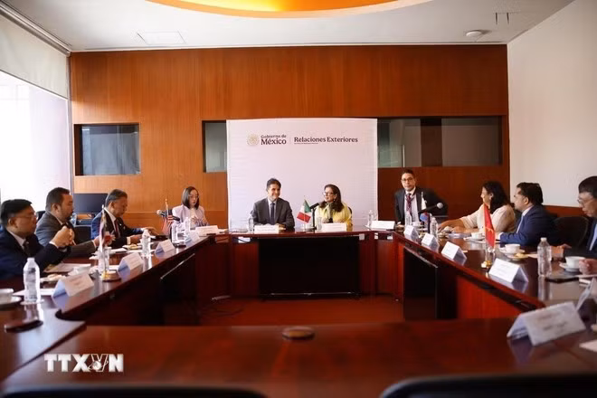 En la reunión (Foto: VNA)