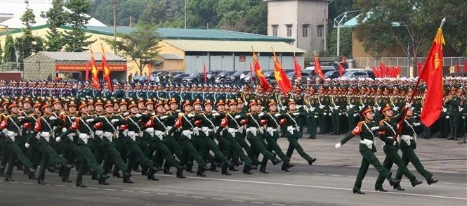 Las fuerzas armadas participan en el ensayo. (Foto: VNA)