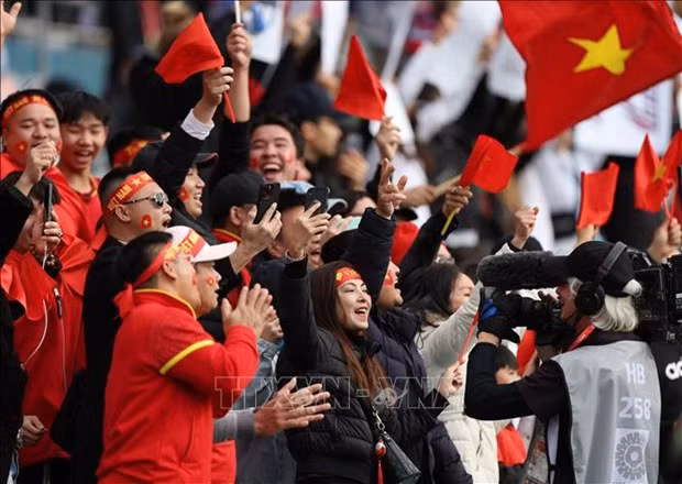 Aficionados vietnamitas en el estadio. (Foto: VNA) Aficionados vietnamitas en el estadio. (Foto: VNA)