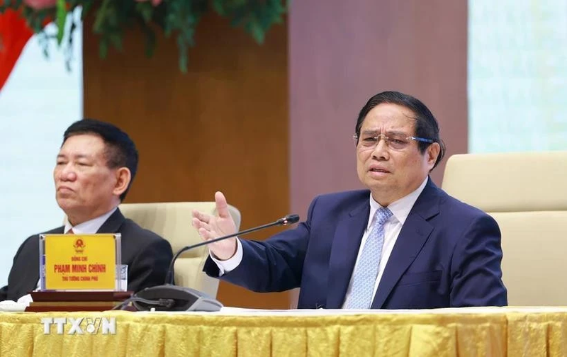 El primer ministro de Vietnam, Pham Minh Chinh, preside la reunión. (Foto: VNA)