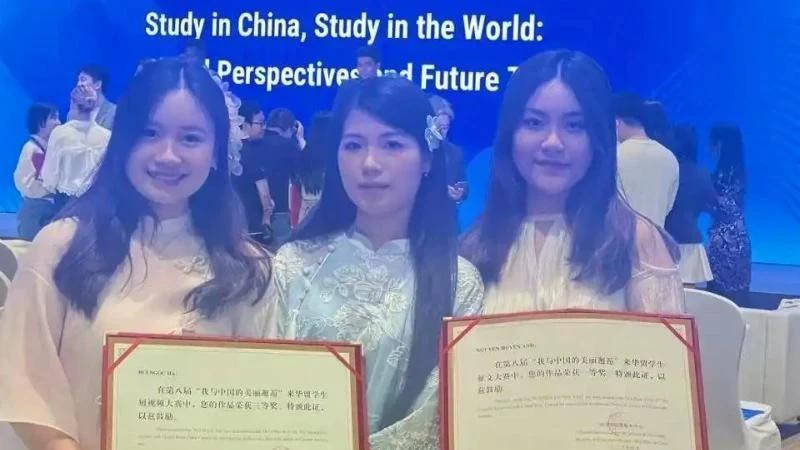 Estudiantes vietnamitas en China. (Foto: Nhan Dan)