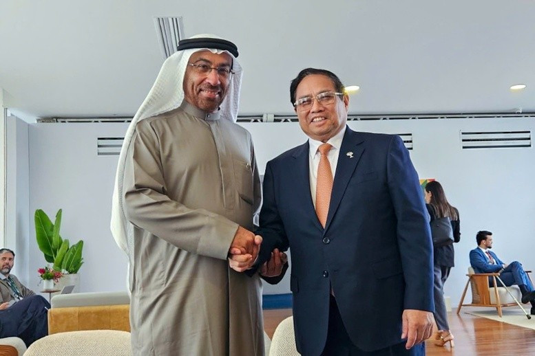 El primer ministro Pham Minh Chinh se reúne con el ministro de Estado de Asuntos Exteriores de los EAU, Ahmed Ali Bin Al Sayegh, en Río de Janeiro. (Fotografía: VGP) El primer ministro Pham Minh Chinh se reúne con el ministro de Estado de Asuntos Exteriores de los EAU, Ahmed Ali Bin Al Sayegh, en Río de Janeiro. (Fotografía: VGP)
