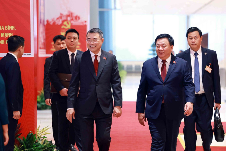 Delegados del XIV Congreso Nacional del Partido acuden a la sesión preparatoria del evento.