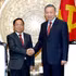 El secretario general del Partido Comunista y presidente de Vietnam, To Lam (derecha), recibe a Khamphan Phommathat, miembro del Buró Político del Comité Central del Partido Popular Revolucionario, viceprimer ministro y titular de Justicia de Laos.
