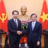 El director de la Academia Nacional de Política Ho Chi Minh, Doan Minh Huan, y el embajador de China en Vietnam, He Wei. (Foto: VNA)