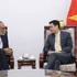 El vicecanciller vietnamita Dang Hoang Giang y Amandeep Singh Gill, subsecretario general de las Naciones Unidas (ONU) y enviado especial para la Tecnología (Foto: VNA)