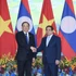 El primer ministro de Vietnam, Pham Minh Chinh, y su par laosiano, Sonexay Siphandone. (Foto: Tran Hai)