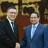 El primer ministro de Vietnam, Pham Minh Chinh, recibe a Hong Tianzhu, presidente del Grupo Texhong de China. (Fuente: VNA)