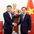 El ministro de Relaciones Exteriores de Vietnam, Le Hoai Trung, y el embajador de la India en Hanói, Tshering Sherpa. (Foto: VNA)