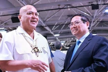El primer ministro de Vietnam, Pham Minh Chinh (derecha) y su homólogo de Tuvalu, Feleti Penitala Teo (Fuente: VNA)