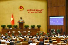 La Asamblea Nacional de Vietnam votan para aprobar varias leyes en el noveno periodo de sesiones. (Fuente: VNA) 