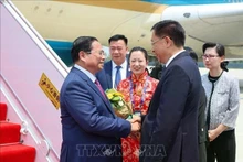El primer ministro vietnamita, Pham Minh Chinh, llega a Tianjin para su participación en la XVI Reunión Anual de los Nuevos Campeones del Foro Económico Mundial y su visita de trabajo a China (Foto: VNA) 