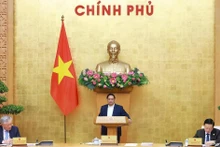 El primer ministro Pham Minh Chinh preside la reunión del Gobierno. (Foto: VNA)