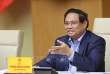 El primer ministro de Vietnam, Pham Minh Chinh, habla en la cita. (Foto: VNA)