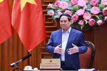 El primer ministro de Vietnam, Pham Minh Chinh, habla en la reunión. (Foto: VNA)