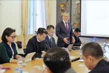 El profesor Nguyen Xuan Thinh, de la Universidad TU Dortmund y presidente de la VGI, en el seminario. (Foto: VNA)