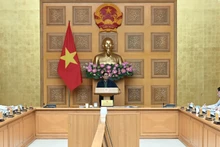 [Foto] Premier vietnamita dirige discusión para mitigar consecuencias de lluvias e inundaciones en región central