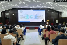 Escena del seminario. (Foto: Nhan Dan)