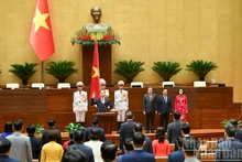 Nguyen Van Quang presta juramento ante la Asamblea Nacional y el pueblo. (Foto: Nhan Dan)