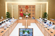 El primer ministro de Vietnam, Pham Minh Chinh, preside la reunión. (Foto: Nhan Dan) 
