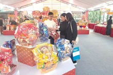 En los stands del evento. (Foto: VNA)