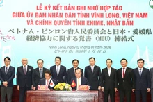 En el acto de firma. (Foto: Nhan Dan)