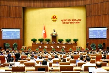 En una reunión del noveno período de sesiones de la Asamblea Nacional de la XV legislatura. (Foto: VNA)