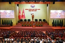 En la sesión de clausura del XIV Congreso Nacional del Partido Comunista de Vietnam. (Foto: VNA)