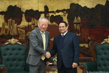 [Foto] Premier vietnamita se reúne con ejecutivo de China Pacific Construction Group