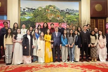 Asistentes al programa. (Foto: Nhan Dan)