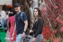 Turistas internacionales visitan Hanói en el Tet. (Foto: VNA)