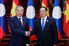 El secretario general del Partido Comunista de Vietnam, To Lam, (izquierda) y el primer ministro de Laos, Sonexay Siphandone (Fuente: VNA)