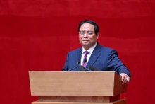 El primer ministro Pham Minh Chinh habla en el evento. (Foto: Nhan Dan)
